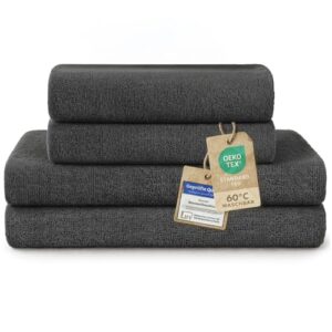 Ein Set von vier Frottiertüchern in Anthrazit, bestehend aus zwei großen und zwei kleinen Handtüchern. Die Tücher sind aus 100% Baumwolle gefertigt und Oeko-TEX zertifiziert.
