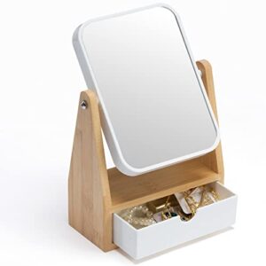 YEAKE Vanity Makeup Spiegel mit Stauraum und 1X/3X Vergrößerung. Der Spiegel hat eine doppelte Oberfläche und eine 360° Drehfunktion. Die natürliche Bambus-Halterung und der matte Kunststoffrahmen machen ihn zu einem dekorativen Accessoire für das Badezimmer oder Schlafzimmer.