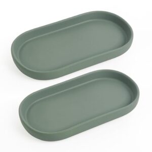 Zwei grüne Keramik-Tische fürs Badezimmer, Toilette und Küche mit dekorativen Oval-Formen, ideal zum Organisieren von Parfüm, Schals, Seife, Kerzen oder anderen Gegenständen.