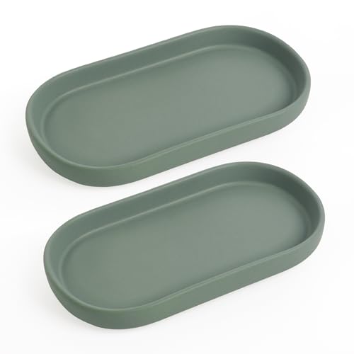 Zwei grüne Keramik-Tische fürs Badezimmer, Toilette und Küche mit dekorativen Oval-Formen, ideal zum Organisieren von Parfüm, Schals, Seife, Kerzen oder anderen Gegenständen.